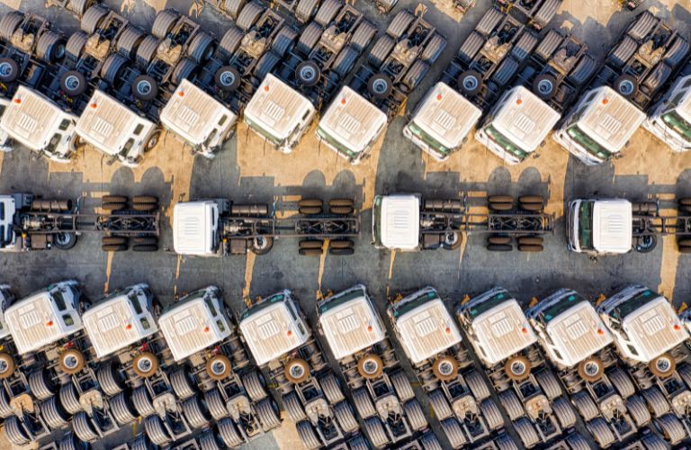 Overhead View of a Fleet of Trucks in a Parking Lot