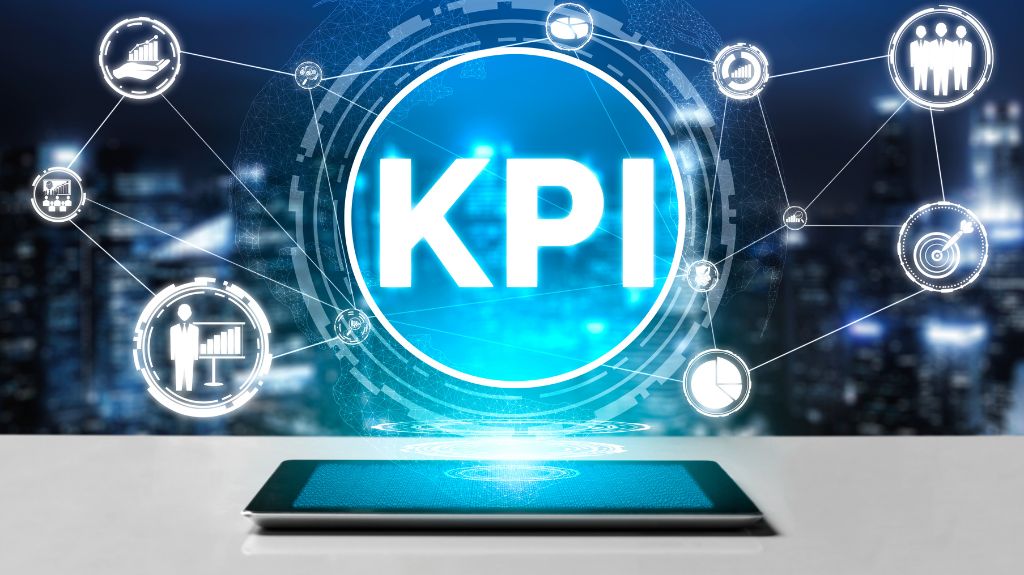 Tablet on Table with KPI Graphics