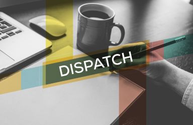 Dispatch Text Over Background of Laptop and Coffee Mug