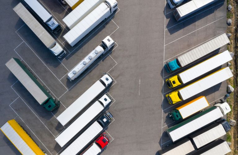Overhead View of Semi Trucks in a Parking Lot
