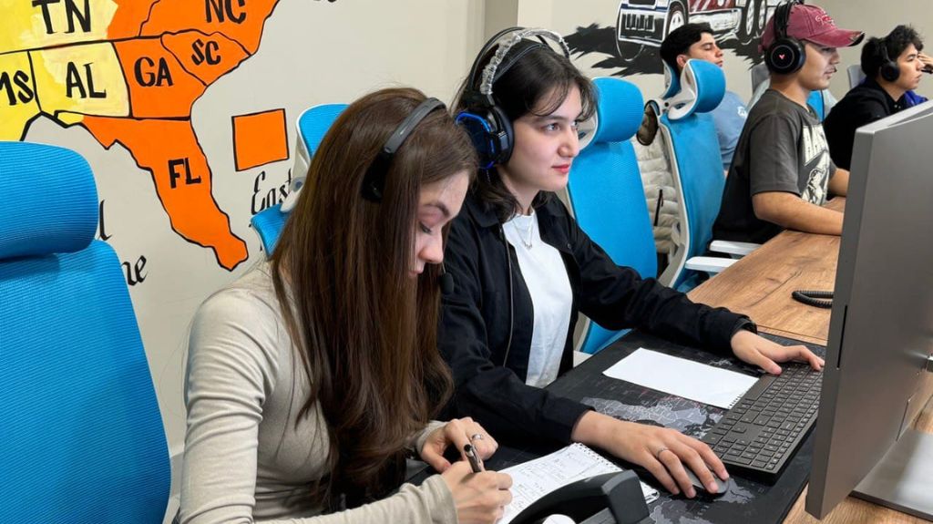 Freight Dispatchers Working at Computers